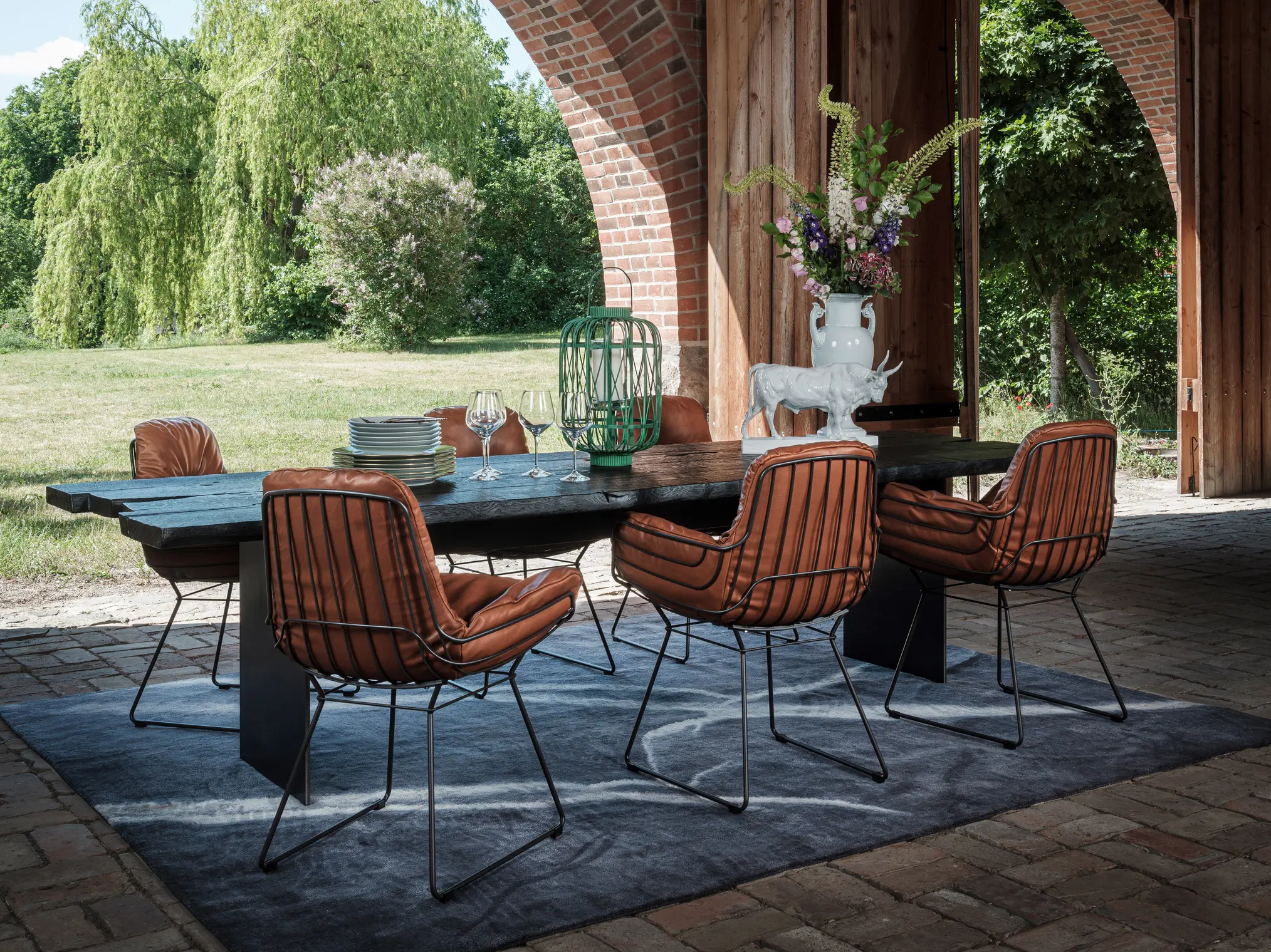 Freifrau Leyasol armchair with removable cushions - outdoor luxury seating at Goettling Interiors